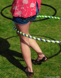 Woman's legs with hula hoop