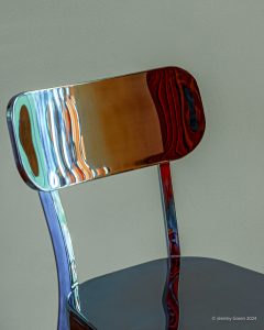 Shiny reflective chair back.