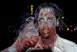 young couple dressed for Halloween, as dead people