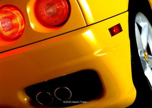 Yellow rear quarter of a Ferrari Modena