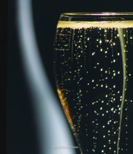 Sparkling Cuvée in a flute with champagne bottle shape